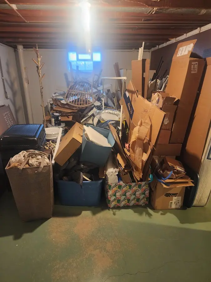 Roll-off dumpster container at job site for Roll Off Dumpster Rental in Owosso